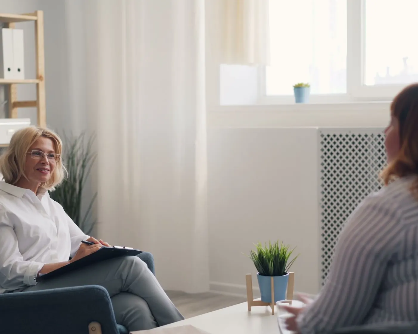A quiet counseling room with two chairs